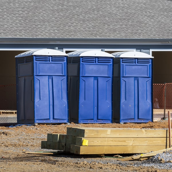 what is the cost difference between standard and deluxe porta potty rentals in Gig Harbor